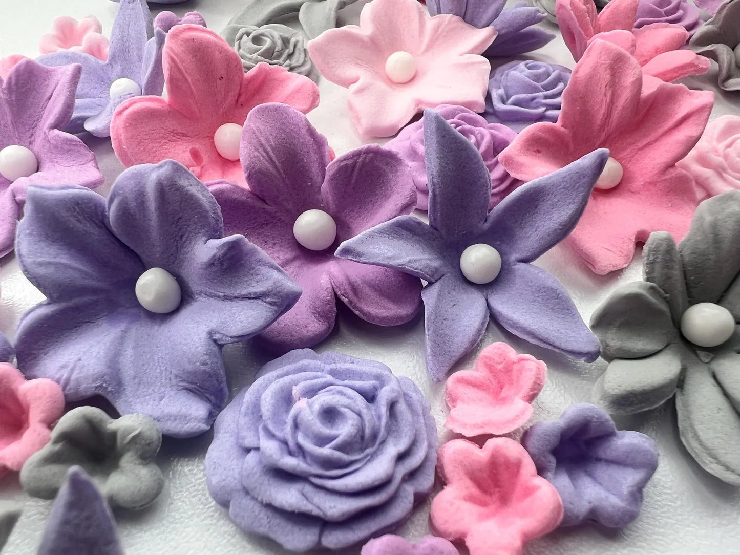 Edible pastel fondant flower decorations for cake decorating