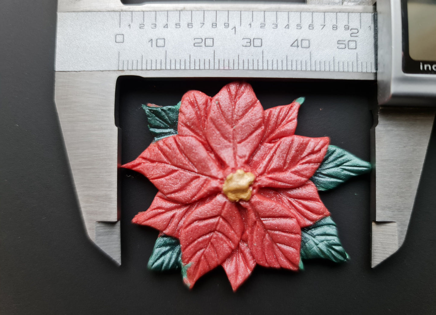 Edible sugar fondant Christmas cake topper, decorations, berries, holly leaves, poinsettia flowers, snowflakes, sprinkles